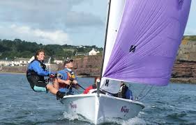 Students sailing confidently in moderate wind